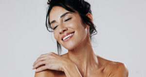 Woman with glowing skin after microneedling PRP treatment in Royal Oak, MI